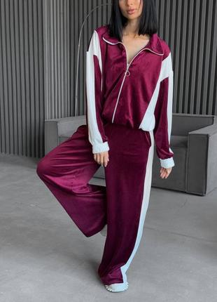 Велюровый комбинированный спортивный костюм с кофтой на молнии с манжетами со свободными брюками с карманами8 фото