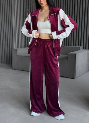 Велюровый комбинированный спортивный костюм с кофтой на молнии с манжетами со свободными брюками с карманами6 фото
