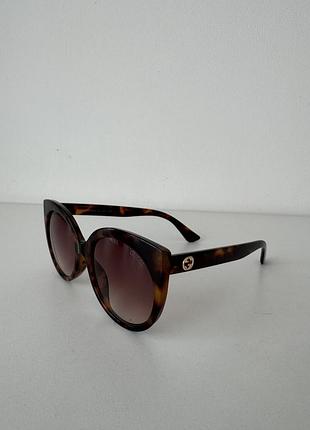 Солнцезащитные очки gucci2 фото