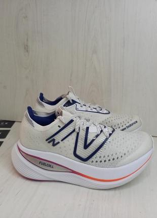 New balance fuelcell supercomp trainer white blue magenta женские кроссовки victory-blue magenta-pop wrcxlw2