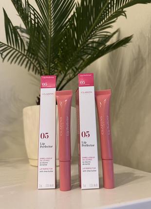 Увлажняющий блеск для губ clarins natural lip perfector