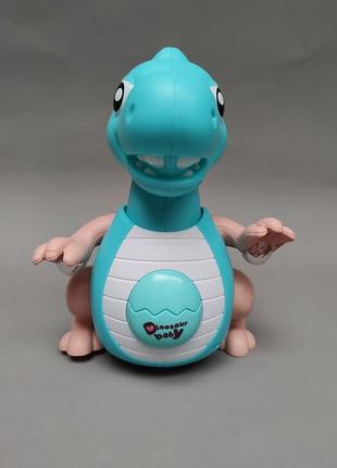 Интерактивный динозавр atoys swing dinosaur blue звуковые и световые эффекты танцует