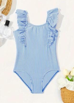 Суцільний купальник на дівчинку з рюшами