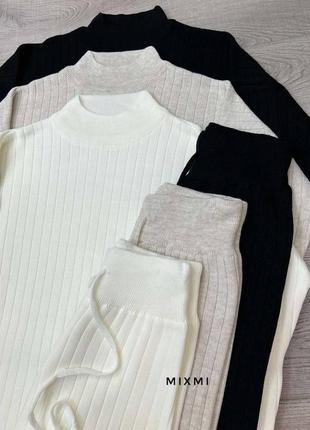 Костюм ангоровий кольори: чорний, беж, білий