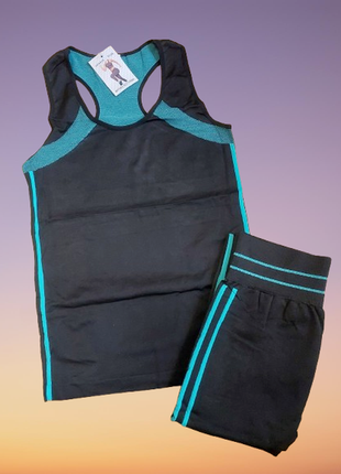 Женские костюмы фитнес р.46-50 разные цвета3 фото