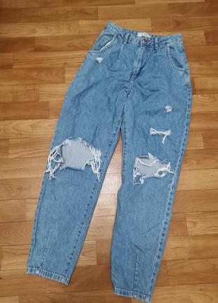 Рвані джинси