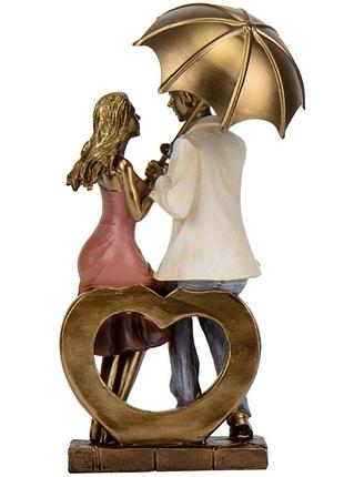 Статуэтка романтика под дождем