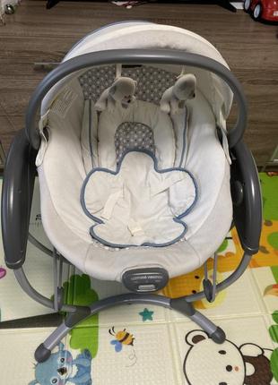 Укачивающий центр graco glider elite spin