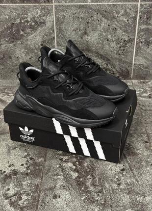Демисезонные черные кроссовки adidas ozweego