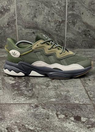 Демисезонные хаки кроссовки adidas ozweego