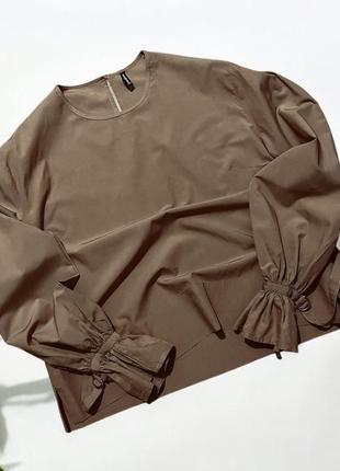 Шикарная блуза с объемным рукавом