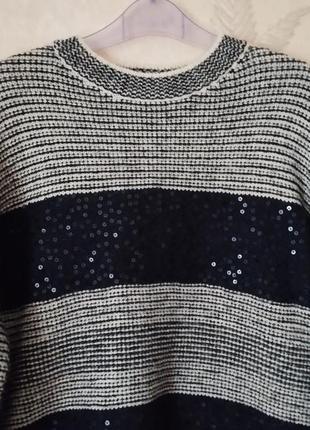 Приятный свитер next в полоску с пайетками.