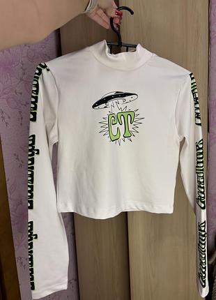 Белый гольф с принтом