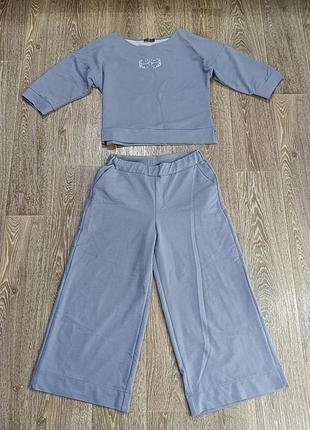 Костюм с кюлотами.
свет серый,м/л