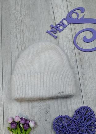 Женская зимняя вязаная шапка odyssey бежевого цвета размер 55/58