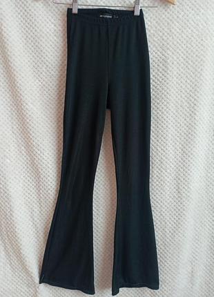 Трикотажные клешные брюки