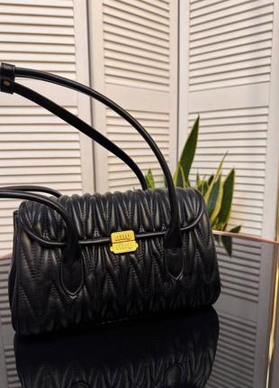Кожаная сумка miu miu