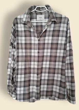 Жіноча повсякденна картата сорочка.