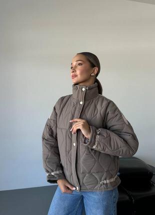 Куртка стеганая женская.