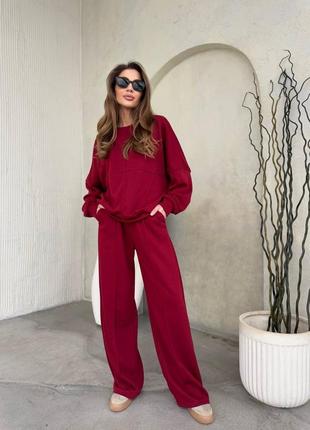 Спортивный костюм с свитшотом с декоративными швами с манжетами с широкими брюками с шнурками с карманами с стрелками