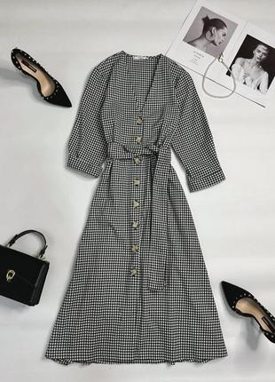 Красива сукня міді в клітинку