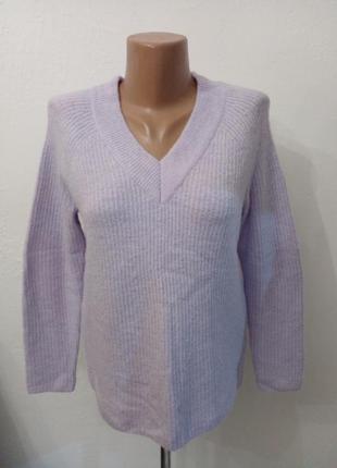 Пуловер в пастельному бузковому кольорі