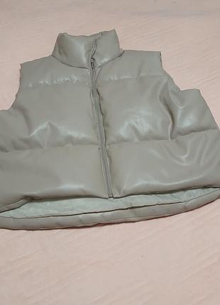 Женская жилетка