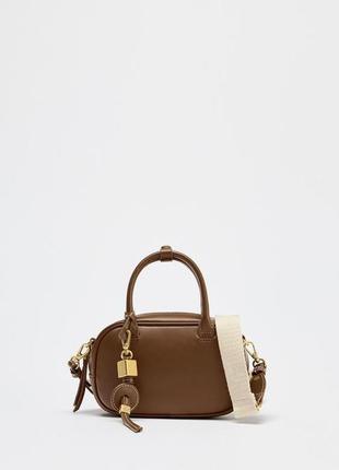 Невелика сумка зі строчками zara