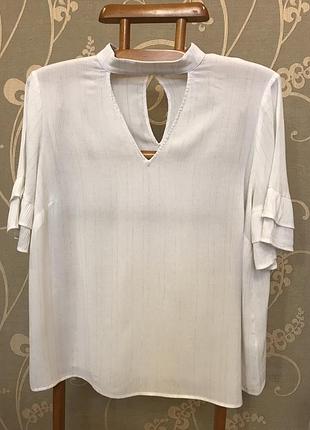 Очень красивая и стильная брендовая блузка..вискоза.