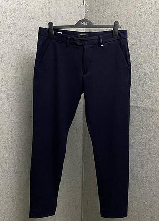 Синие брюки от бренда jack&jones