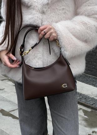 Сумка кожаная coach