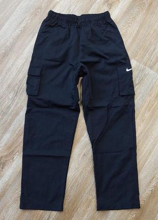 Жіночі нейлонові штани nike cargo3 фото