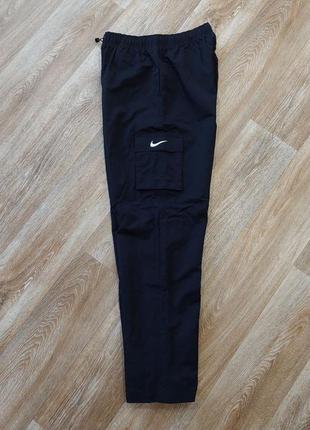 Жіночі нейлонові штани nike cargo5 фото