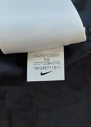 Жіночі нейлонові штани nike cargo8 фото