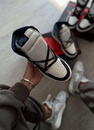 Кроссовки nike jordan 1 retro high obsidian unc2 фото