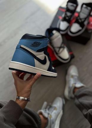 Кроссовки nike jordan 1 retro high obsidian unc4 фото