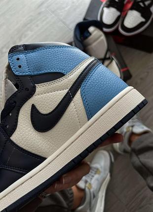 Кроссовки nike jordan 1 retro high obsidian unc3 фото