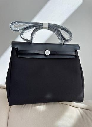 Чорна сумка зі срібною фурнітурою текстиль + шкіра