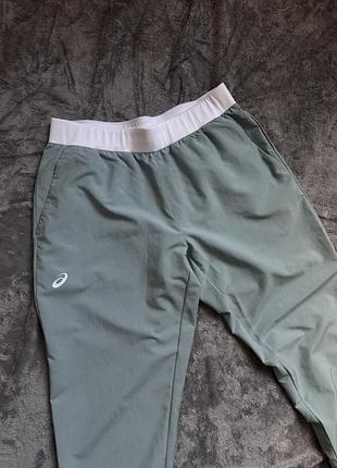 Легенькі спортивні штани asics