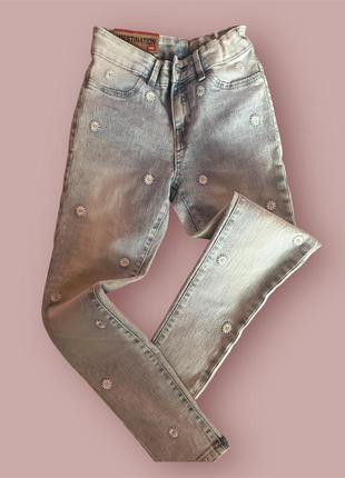 Джинси з вишивкою skinny