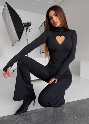 Жіночий теплий комбінезон на флісі з штанами кльош з замком на спинці