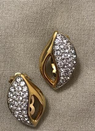 Кліпси з кристалами swarovski в позолоті є маркування