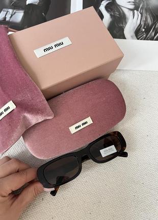 Солнцезащитные очки miumiu