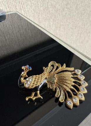 Стильна вінтажна брошка у вигляді павича