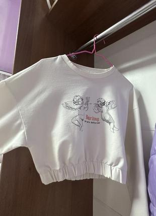 Спортивный костюм, кофта и штанишки, очень удобный, кофта укороченная на резинке, брюки внизу таковой на резинке