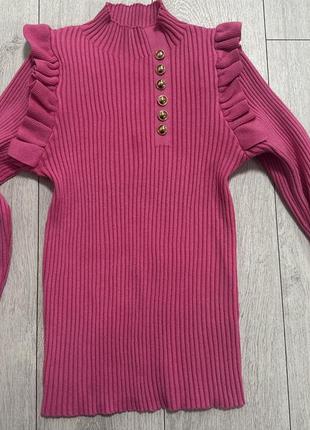 Светр рожевий,з рюшами