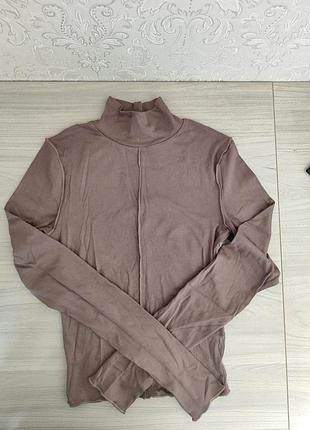 Жіночий гольф з декоративними вистрочками