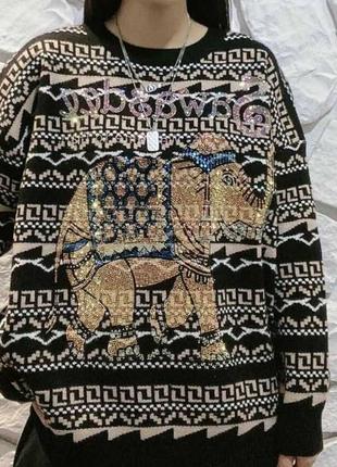 Шикарний теплющий светрик не об'ємний шерсть