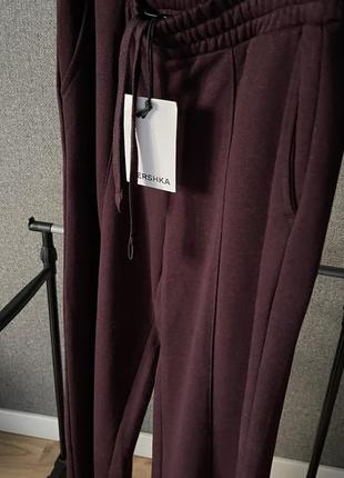 Тренд весни. брюки /штани спортивного стилю темно-вишневого кольору
