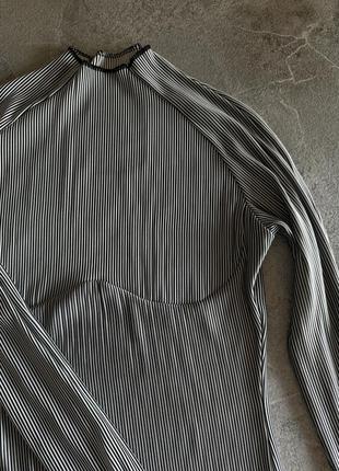 Крутая водолазка в мелкий полоску